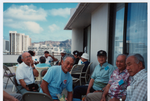 Veterans socializing on hotel patio (ddr-densho-368-343)