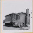 Man sitting on steps of house (ddr-densho-522-462)