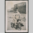 Photo of Paul Ima on a tricycle (ddr-densho-483-814)