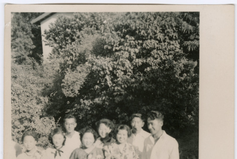Group portrait of eight people (ddr-densho-329-830)