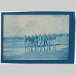 Eight men standing in muddy field (ddr-densho-329-1375)