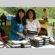 Linda Kubota Byrd and Cathy Oz serving Bento at Annual Meeting (ddr-densho-354-2708)