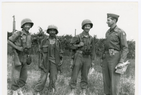 General Clark, Lieutenant Gagnon and two soldiers (ddr-densho-1007-357)