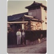 A man and woman in front of a house (ddr-densho-338-318)