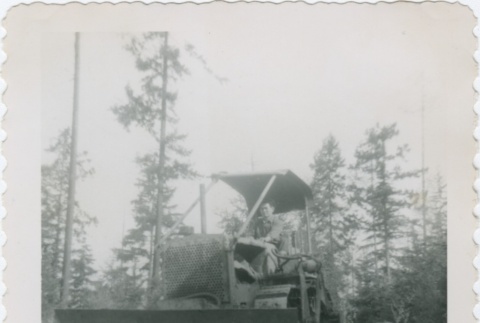 A man driving a tractor (ddr-densho-296-213)
