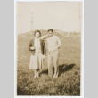 Man and woman in field (ddr-densho-383-410)