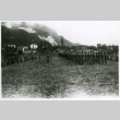 Group drill near mountain (ddr-densho-1007-866)