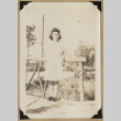 Massaye on a bridge (ddr-densho-542-578)