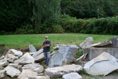 Don Brooks with stockpiled stone (ddr-densho-354-1753)