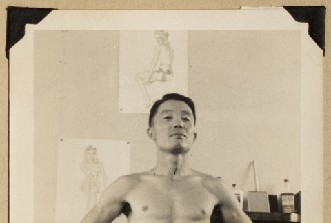 Frank Eya in his barrack (ddr-densho-542-557)