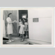 Miss Vetterick hands out final report cards (ddr-densho-37-2129)