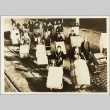 Female factory workers carting supply boxes (ddr-njpa-13-244)