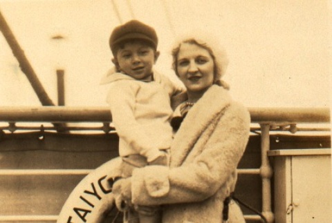 Woman holding boy on board Taiyo Maru (ddr-njpa-4-135)