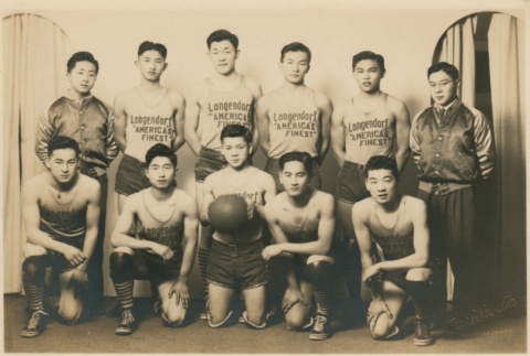 Basketball team in team jerseys (ddr-densho-348-4)