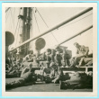 Soldiers socializing on deck of ship (ddr-densho-368-268)