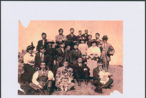Group photo taken in field with 21 people. (ddr-densho-423-453)