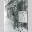 Clarence Matsumura standing next to a 522nd sign (ddr-densho-22-96)