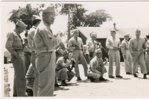 Group of men in uniform with cameras (ddr-ajah-2-12)