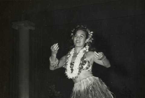 Miss Hawaii wearing grass skirt and leis, performing hula (ddr-njpa-2-847)