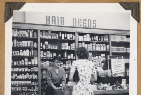 Two women in the hair needs department (ddr-densho-542-108)