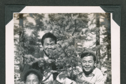 Three men in forest (ddr-densho-550-268)