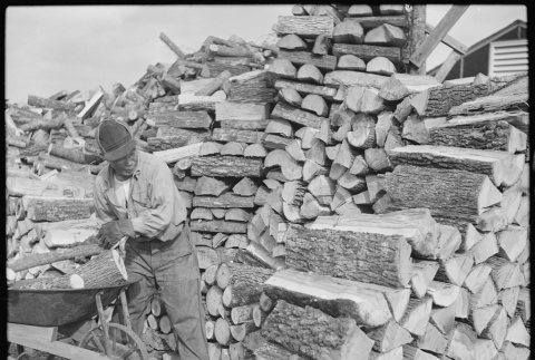 Japanese American chopping wood (ddr-densho-37-611)