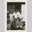 Group of young men in front of barracks (ddr-manz-7-17)
