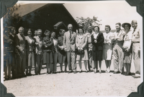 Group of men and women posing in line (ddr-ajah-2-495)