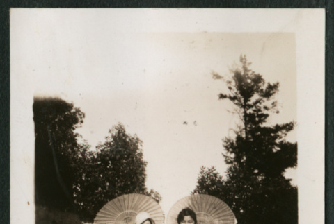 Two women with parasols (ddr-densho-359-715)