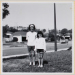 Two girls standing in yard (ddr-densho-522-105)