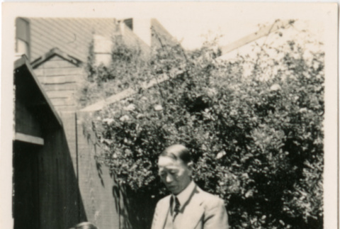 Tomoyuki Nozawa (seated) with unidentified man (ddr-densho-426-2136)