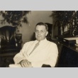 Man seated in an office (ddr-njpa-2-414)