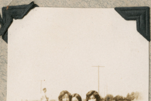 Three women sitting in field (ddr-densho-383-51)