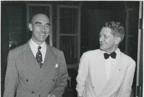 T. Seabald and William Draper headed to dinner held in Draper's honor (ddr-densho-299-169)
