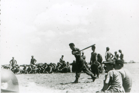 Soldier hitting baseball (ddr-densho-1007-791)