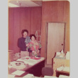 Man and woman behind desk (ddr-densho-426-1240)