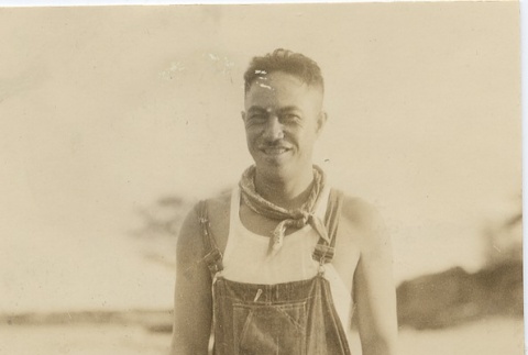 Man in overalls on the beach (ddr-njpa-1-1631)