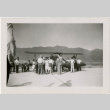 People with plane at Manzanar airport (ddr-manz-8-6)