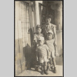 Agnes, David, Chester Jr. and Gerald Sakura on sidewalk (ddr-densho-523-153)