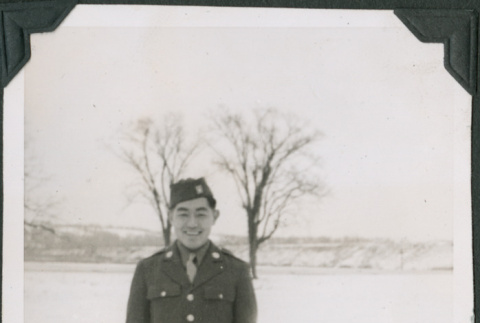 Man in uniform standing in snow (ddr-ajah-2-439)