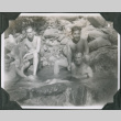 Four men sitting in river (ddr-ajah-2-636)