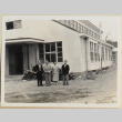 Four people outside a building (ddr-densho-433-732)