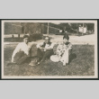 3 men sitting in a yard (ddr-densho-378-831)