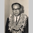 Man wearing leis (ddr-njpa-4-2104)