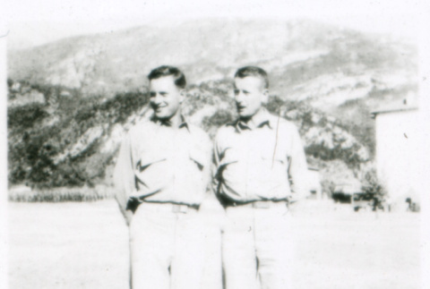 Two men in front of hills (ddr-densho-1007-775)