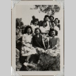 Nine women sitting on rocks (ddr-densho-587-36)