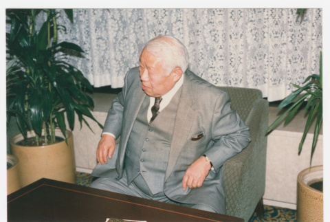 Masaru Ogawa in chair (ddr-densho-1007-409)