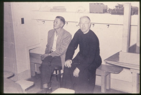 Priest and man seated (ddr-densho-330-199)