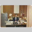 Man seated in office (ddr-densho-426-138)