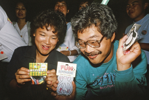 Kelly Kawakami and Alpha Goto with casino night winnings (ddr-densho-336-1814)